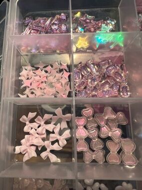 Little decorative pink compartmentalized plastic bling things